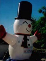 Snowman advertising balloons - our economy 20ft. snowman inflatables available for purchase or rent.